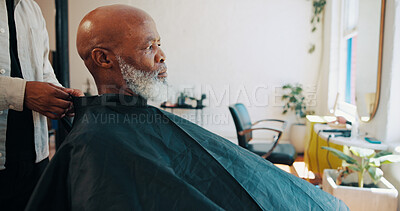 Buy stock photo Man, hands and client in barber shop with cape for grooming service, makeover or styling appointment. People, senior customer or consultation in salon with cover, start and getting ready for haircut.