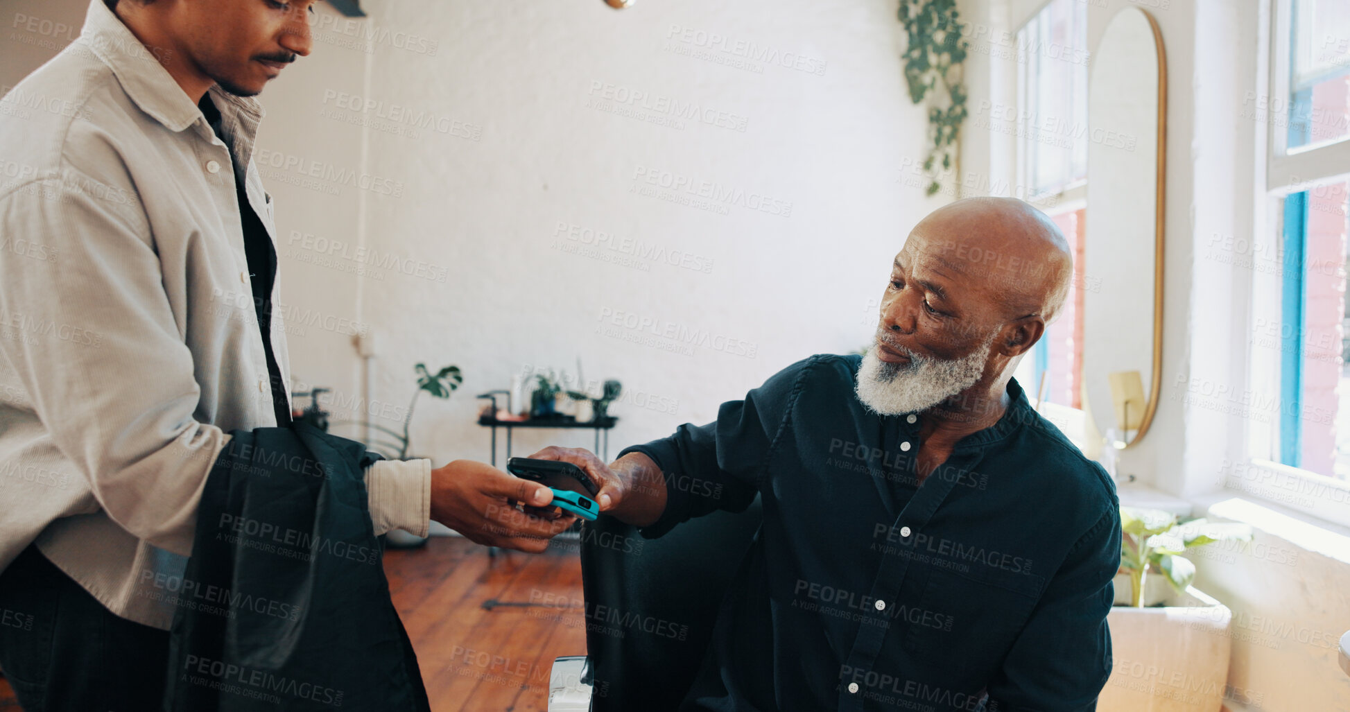 Buy stock photo Man, barber or customer paying with phone for payment, banking or pos machine in salon. Male people, hairdresser or client with mobile smartphone app for NFC tap or wireless transaction in parlor