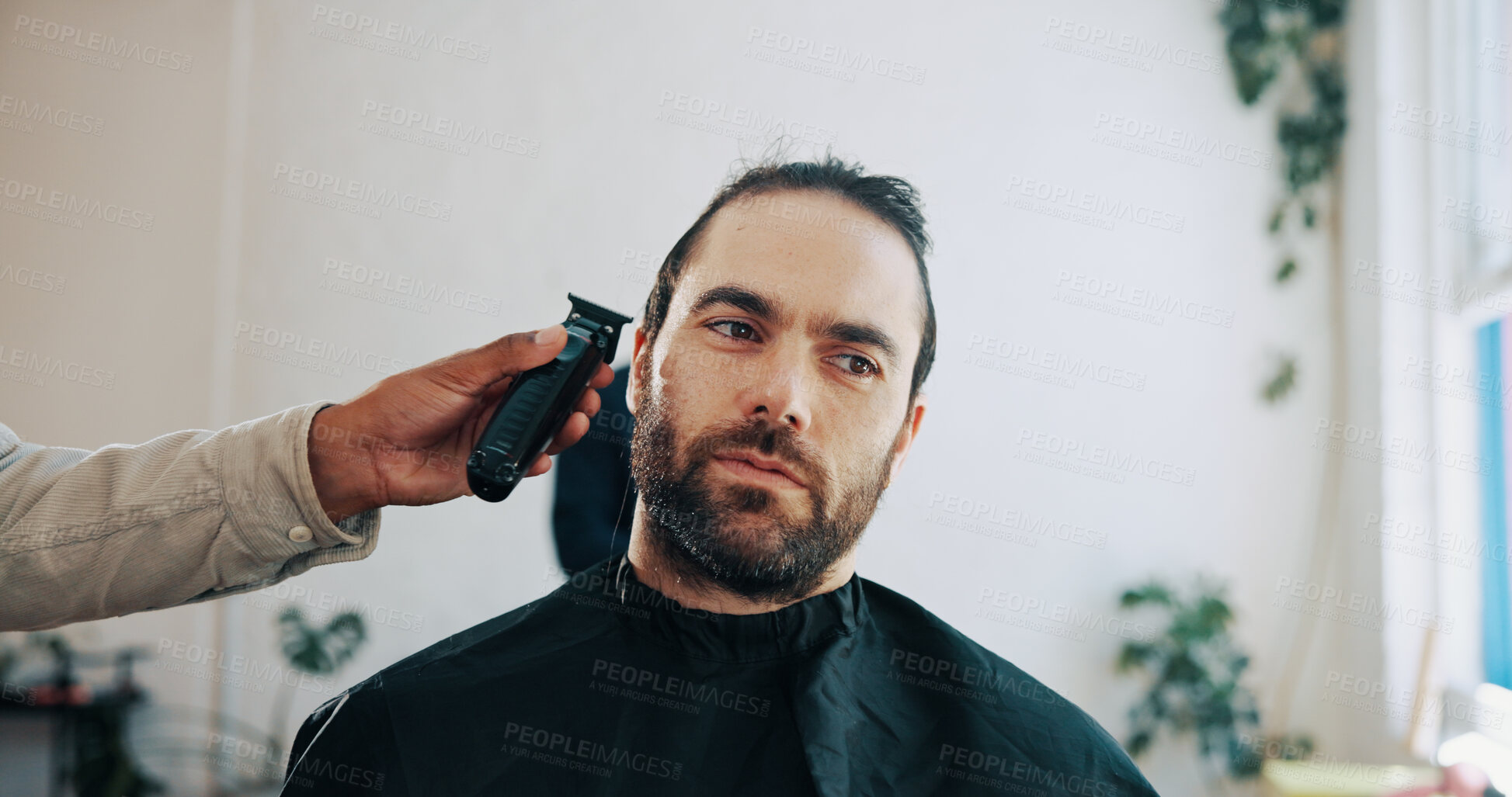 Buy stock photo Hands, barber and clippers for haircut, trim or thinking for grooming service at small business. People, client and customer experience at barbershop, shaving beard or decision for hairstyle at salon