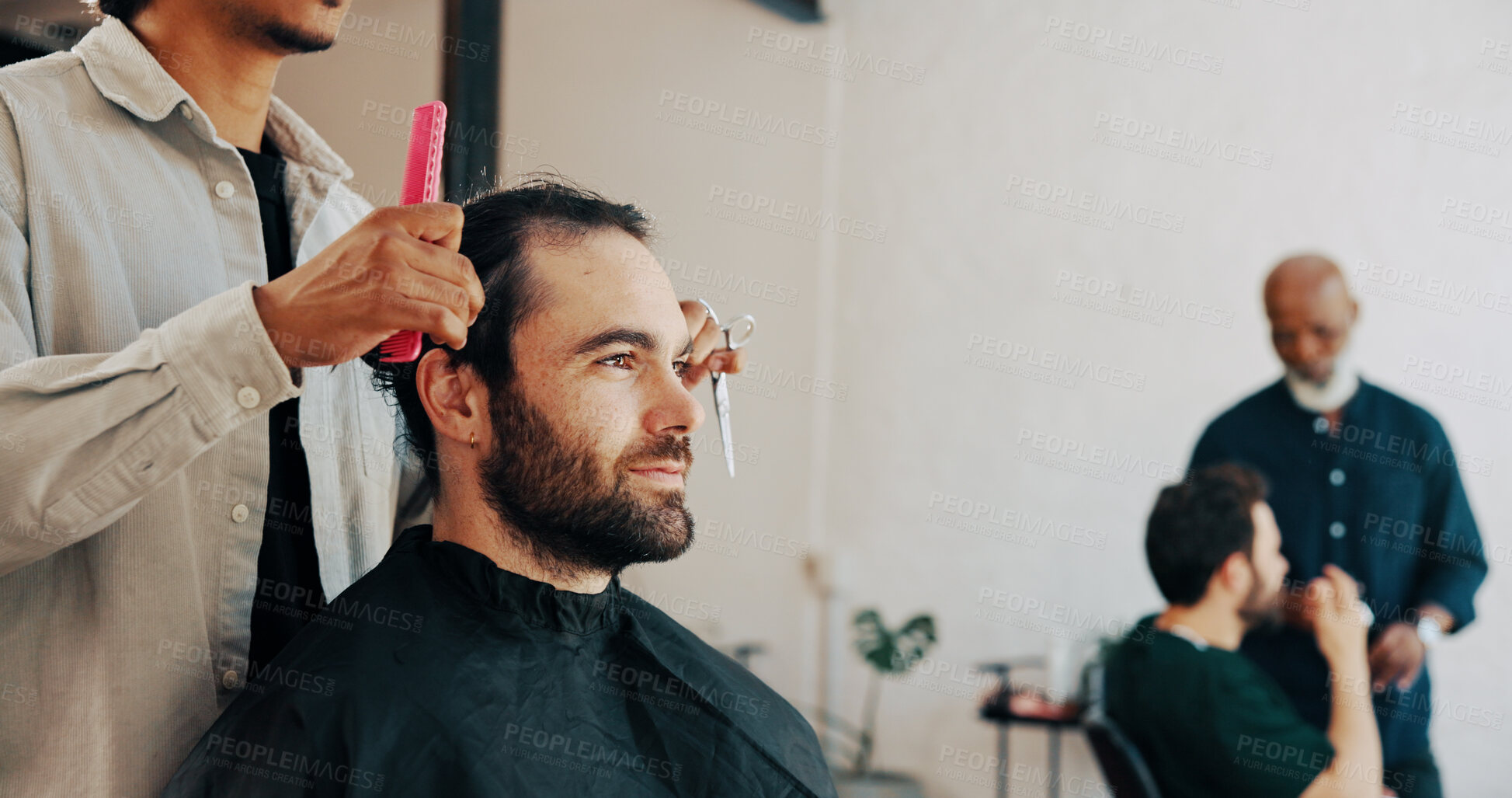 Buy stock photo Hair salon, service and barber with client at appointment for grooming, haircut and trim for beard. Hairdresser, tools and person with man in chair for styling, shave and treatment in barbershop