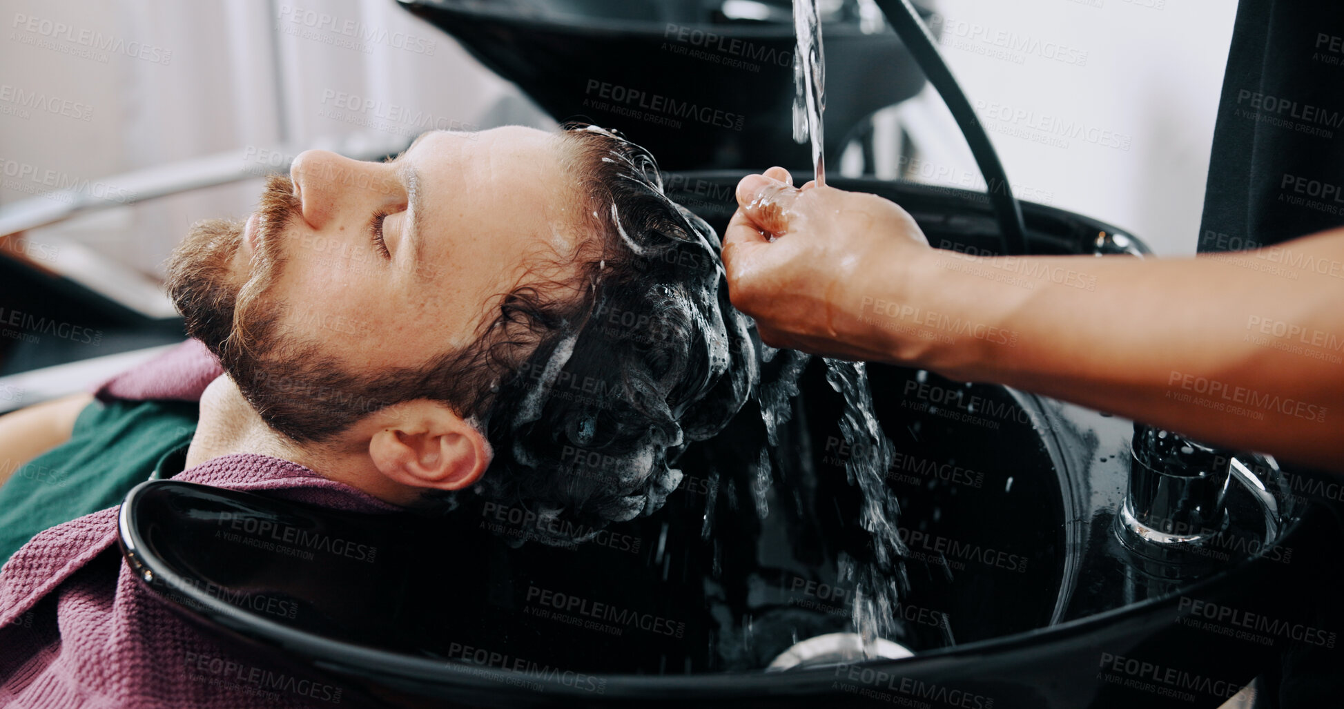 Buy stock photo Hands, man and washing hair at barbershop with water, basin and grooming services at salon. People, shampoo and conditioner for hygiene, product and growth benefits with customer experience at store