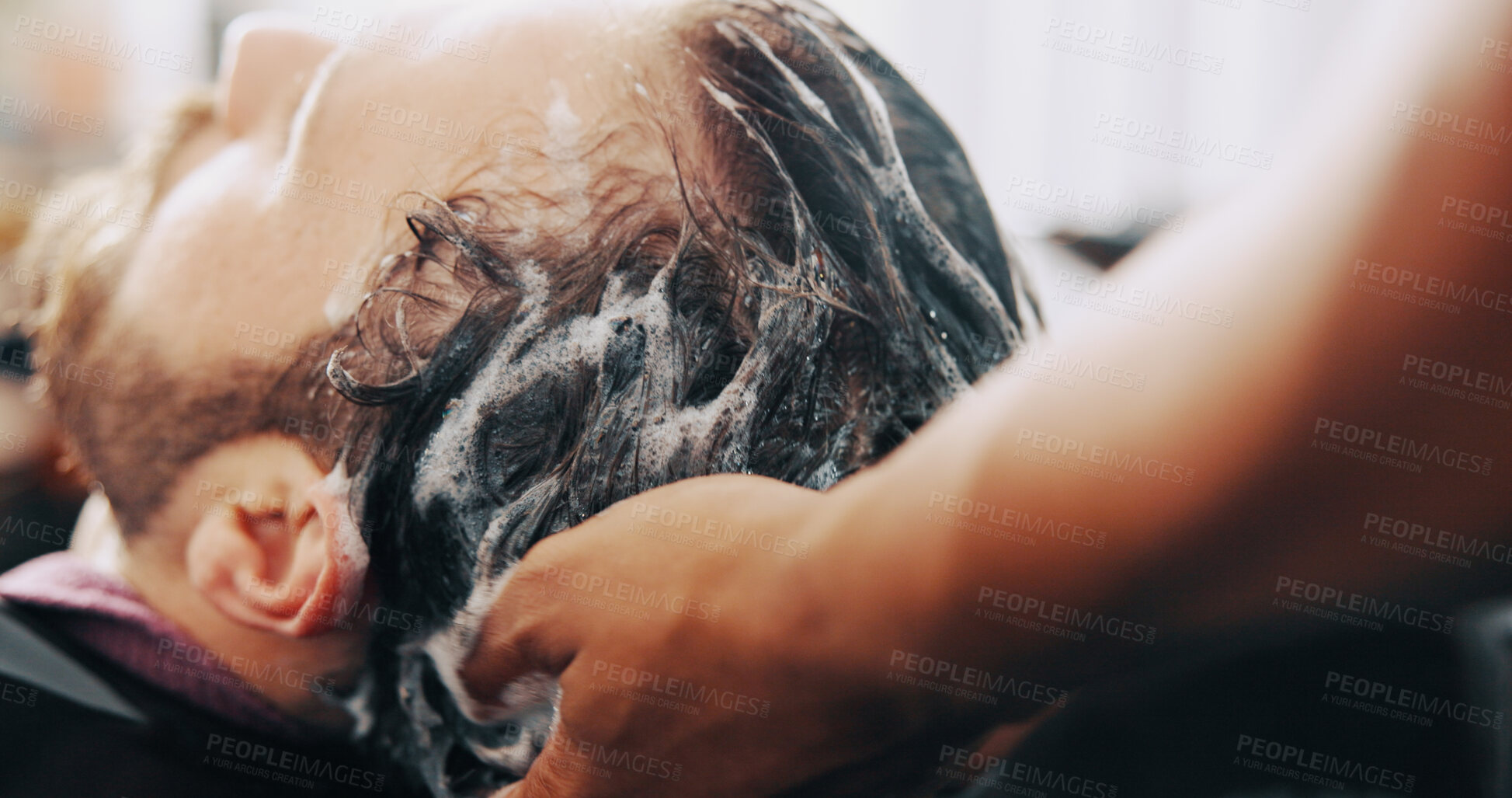 Buy stock photo Hands, man and washing hair at barbershop with shampoo, cleaning or grooming services at salon. People, foam and conditioner for hygiene, product and growth benefits with customer experience at store