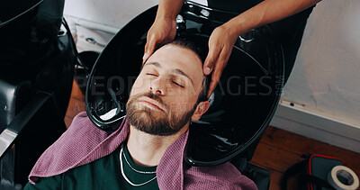 Buy stock photo Hands, man and washing hair at barbershop for scalp, shampoo or grooming services at salon. People, water and conditioner for hygiene, above and growth benefits with customer experience at store