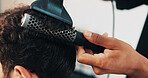Hands, brush and blow dryer at barbershop for hairstyle, hygiene or grooming services at salon. People, tools and equipment for texture, comb and growth benefits with customer experience at store