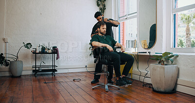 Buy stock photo Consultation, blowdryer and barber with man in salon for haircut, maintenance or discussion. Appointment, grooming and male hairdresser with customer for trim, hairstyle or self care in parlor.