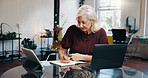 Agenda, notebook and planning with woman at desk in small business office for startup research. Schedule, technology and writing with mature employee in office for brainstorming or to do list