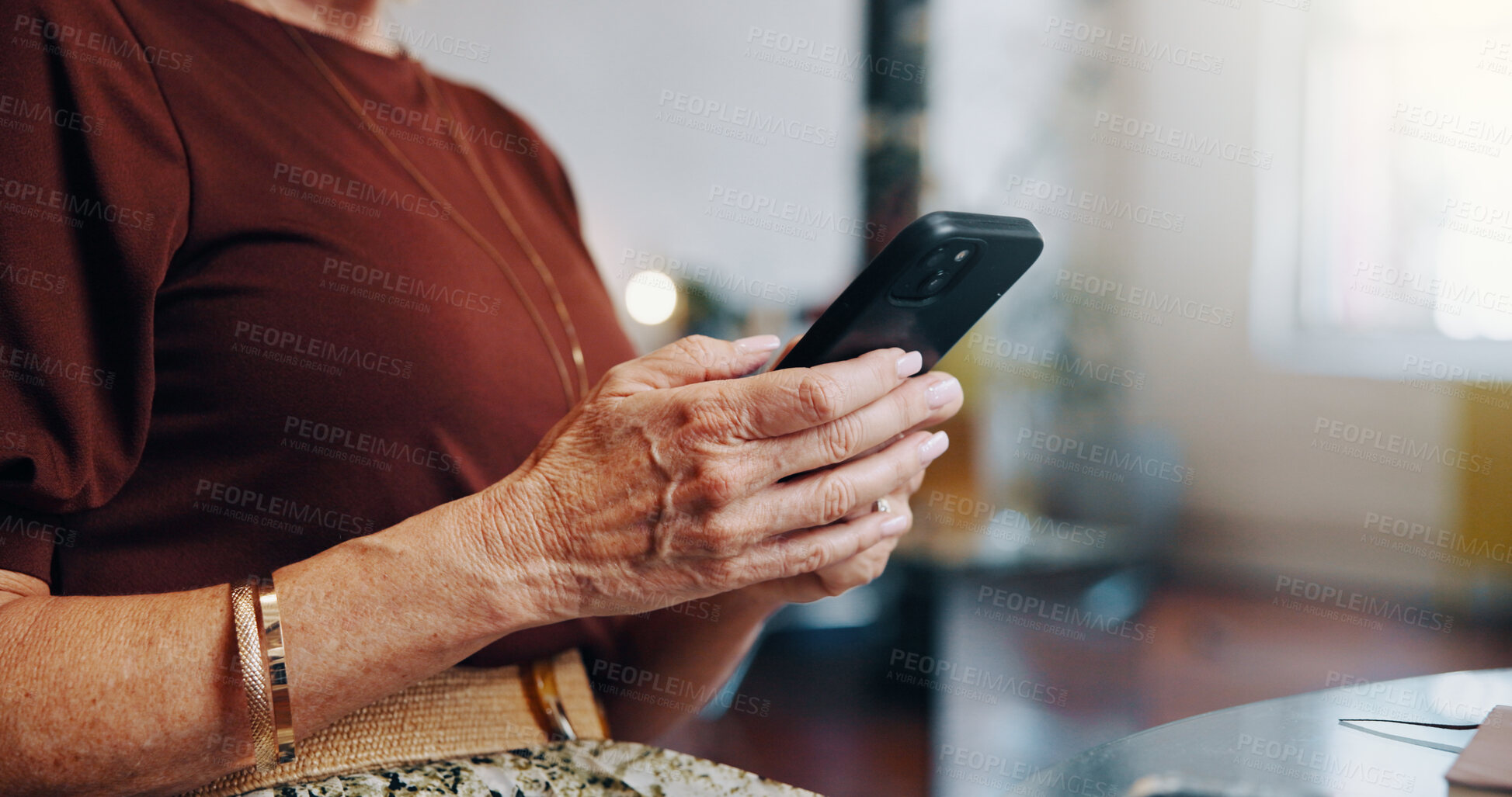 Buy stock photo Woman, hands and typing in small business with phone for client appointment update, schedule and email. Mature person, scroll and browsing in workplace with tech, customer online booking and admin.