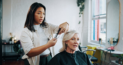 Buy stock photo Mature woman, hairdresser and scissors with discussion at salon, hairstyle and decision for change. People, hair care and grooming services with tools, talk and customer experience at beauty parlor