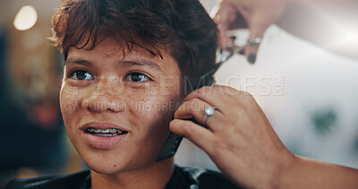 Buy stock photo Hands, kid and service at hair salon for haircut, grooming or texture maintenance with flare. Teen, boy and trim hairstyle with hairdresser in small business with barbershop tools, comb or scissors