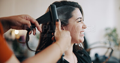 Buy stock photo Smile, hairstylist and straightener with woman in salon for cosmetology, beauty and grooming. Hairdresser, parlor and customer makeover with people in store for hair care, relax and flat iron