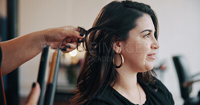 Buy stock photo Client, hairstylist and straightener with woman in salon for cosmetology, beauty and grooming. Hairdresser, parlor and customer makeover with people in store for hair care, relax and flat iron