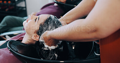 Buy stock photo Salon, woman and washing hair in sink with shampoo for maintenance, hygiene or styling appointment. People, hairdresser or clean client scalp in basin with liquid soap, grooming or massage treatment.