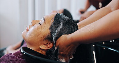 Buy stock photo Shampoo, hairstylist and washing with woman in salon for cosmetology, beauty and grooming. Hairdresser, parlor and customer makeover with people for hair care, rinse and scalp detox treatment