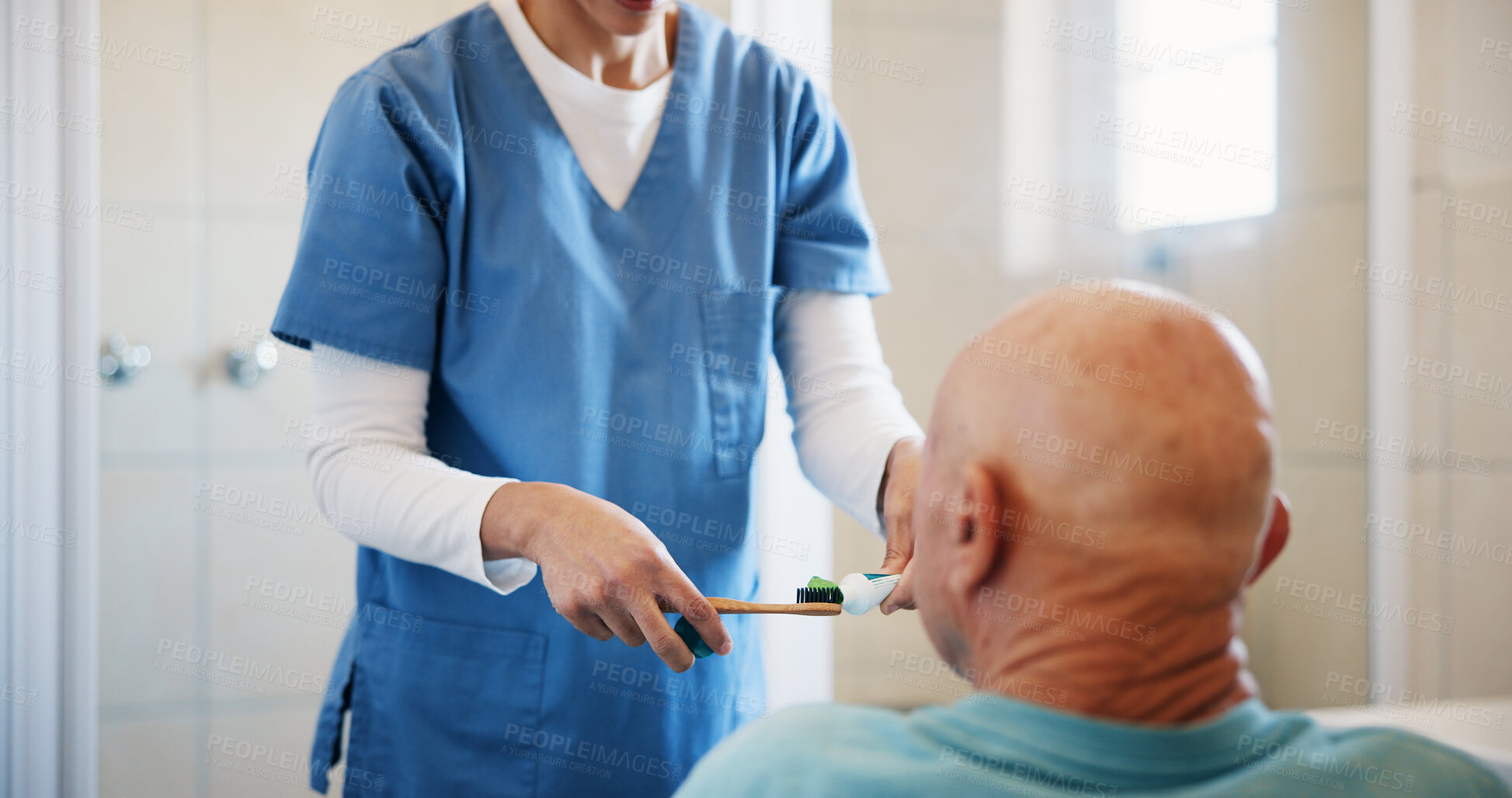 Buy stock photo Nurse, hands and toothbrush for old man in bathroom, assisted living and dental hygiene in home. Caregiver, toothpaste and sustainable oral product for elderly person with disability in retirement