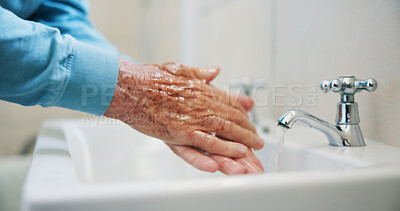 Buy stock photo Health, hand washing and person in house with sink, bacteria prevention or wellness in retirement. Safety, cleaning and old man in bathroom with water, germ protection or care in hygiene routine.