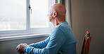 Senior man, walking stick and thinking at window, home and reflection with recovery, insight or nostalgia. Elderly person with disability, cane and perspective with rehabilitation, rest or retirement