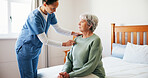 Senior woman, nurse and bed with checkup for healthcare, assisted living or exam in retirement home. Elderly, female person or caregiver checking patient for support, trust or help in old age house