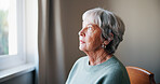 Thinking, remember and senior woman in home for memory, reflection or nostalgia with depression. Sad, planning and elderly female person in retirement with ideas, decision or choice in apartment.