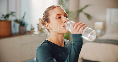 Buy stock photo Fitness, woman or drink water in home for wellness, health or nutrition on break with bottle. Exercise recovery, hydration or thirsty person with liquid in bedroom for detox, electrolytes or minerals