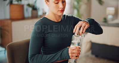 Buy stock photo Woman, relax and water for fitness in bedroom for hydration, exercise break and mineral beverage. Female person, bottle and refreshing liquid from training recovery, detox drink and nutrition in home