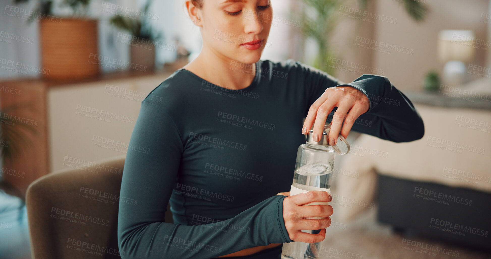 Buy stock photo Woman, relax and water for fitness in bedroom for hydration, exercise break and mineral beverage. Female person, bottle and refreshing liquid from training recovery, detox drink and nutrition in home