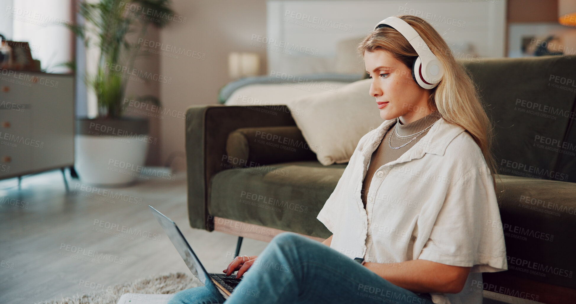 Buy stock photo Laptop, reading or woman with headphones in home, online resume screening or remote work for hiring. Recruiting, streaming music or talent scout review cv for candidate selection, tech or post job ad