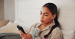 Phone, relax and reading of woman in bedroom for social media, streaming service and comment update. Connection, online chat forum and post with person and tech in home for communication and app