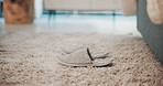 Floor, slippers and carpet in empty bedroom, morning and floor for comfort, relax and pyjamas in hotel. Furniture, interior and shoes for rest, leisure and footwear on rug at luxury accommodation