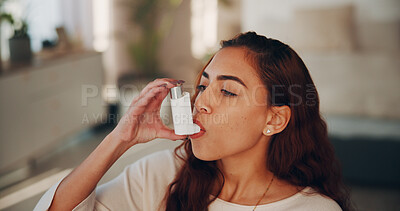 Buy stock photo Medicine, asthma and woman with inhaler in home for prescription medication, health and treatment. Chronic disease, person and oxygen pump in apartment for lung support, wheezing or medical condition