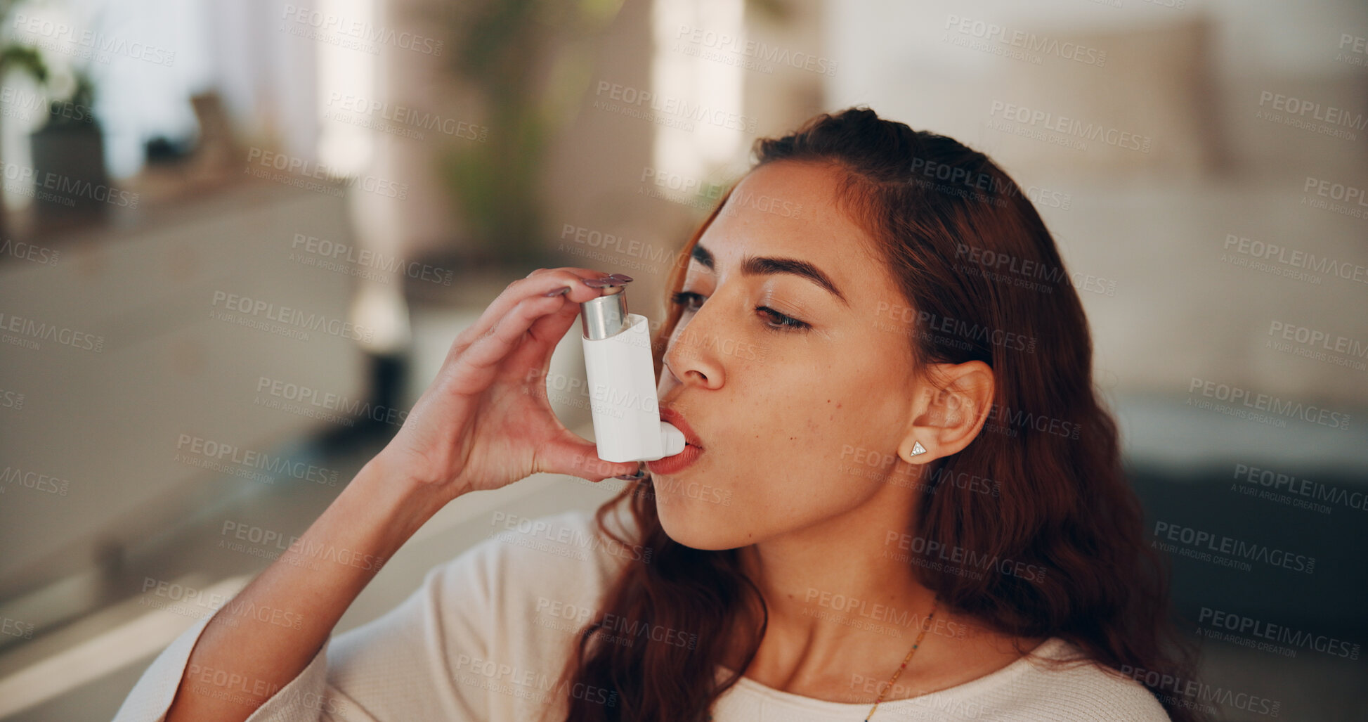 Buy stock photo Medicine, asthma and woman with inhaler in home for prescription medication, health and treatment. Chronic disease, person and oxygen pump in apartment for lung support, wheezing or medical condition