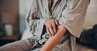 Buy stock photo Scratching, skin and stress in bedroom, hands and coping mechanism for anxiety, discomfort and home. Itchy, arm and person with OCD symptoms, psychology and mental health condition or trauma in house