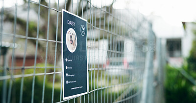 Buy stock photo Animal shelter, fence and poster of rescue dog outdoor for adoption, community or pet ownership. Charity, cage and sign with information on enclosure at pound for activism, attention or welfare