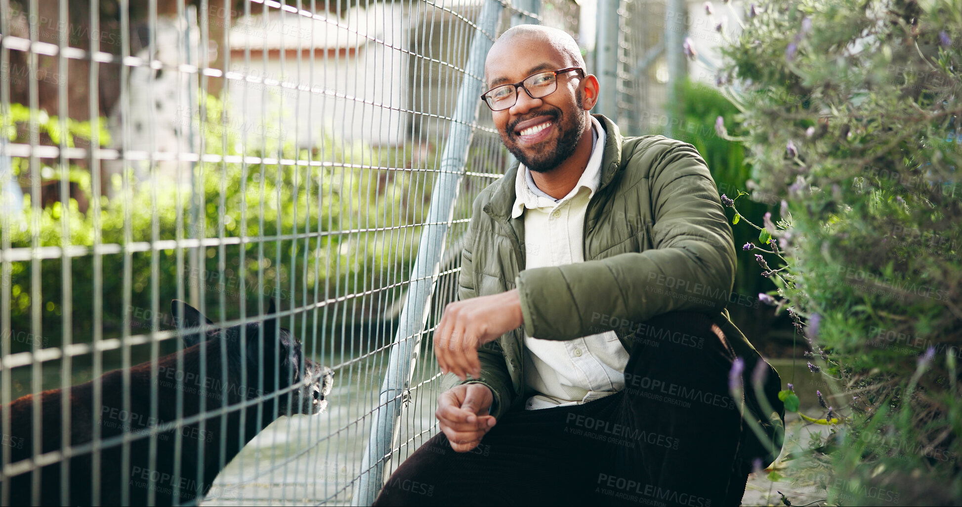 Buy stock photo Portrait, man and dog at shelter for animal adoption with happiness, kindness and companion search. Weekend, black person and puppy at pet rescue for volunteer service, ngo support and canine foster.