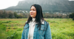 Thinking, view and woman with smile at field, winter vacation or weekend outing for wellness reflection. Thoughtful, outdoor or happy person with perspective in nature, holiday peace or watch scenery