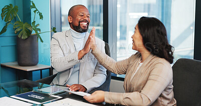 Buy stock photo Happy, business people and high five with documents in office for winning, teamwork or success. Excited, businessman and woman with smile or paperwork for promotion or bonus together in workplace