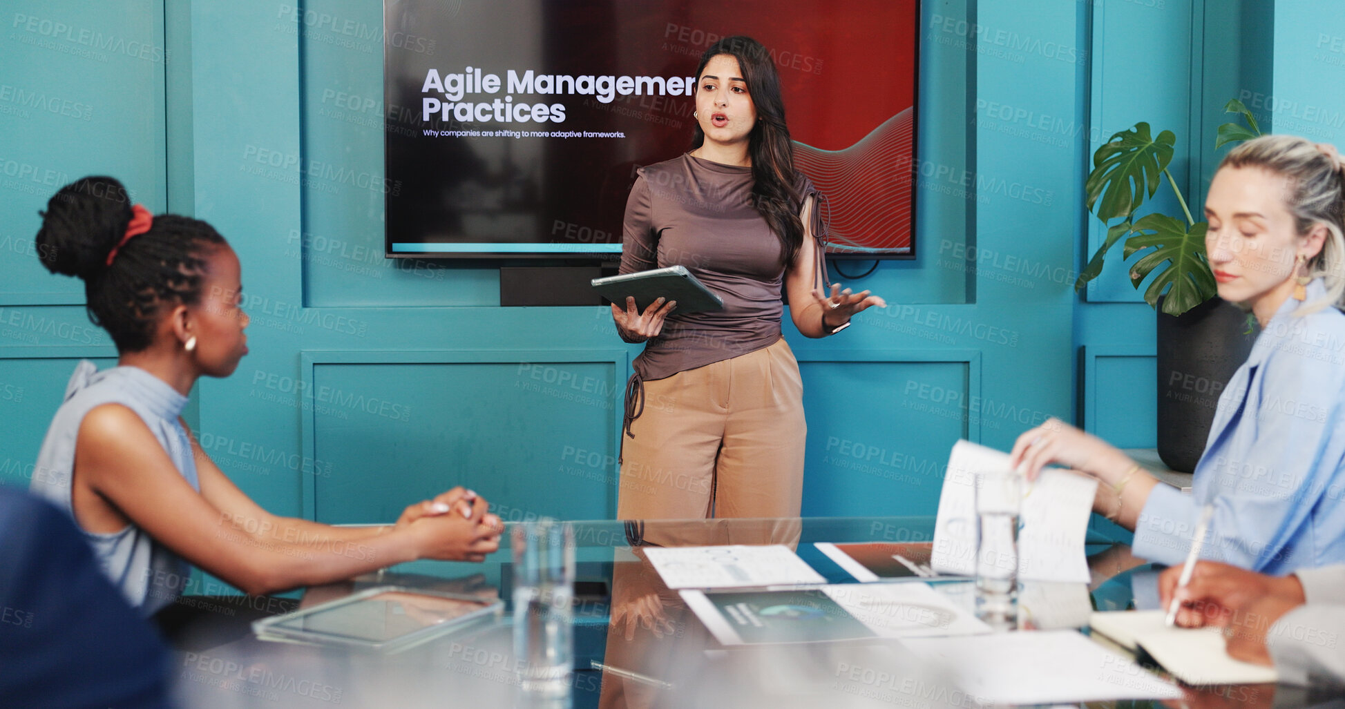 Buy stock photo Woman, presentation and business people in office on tablet for agile management practices in meeting. Corporate, team and speaker with tips, skills development and manager workshop for feedback