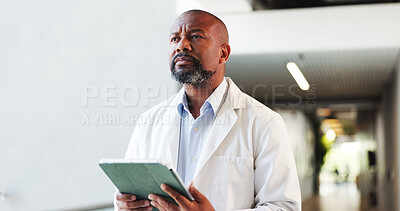 Buy stock photo Doctor, man and thinking with tablet in clinic for test results, treatment planning and solution. Health professional, mature black person and digital tech with insight for medical decision and space