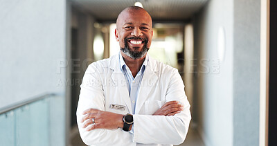 Buy stock photo Doctor, healthcare and black man with arms crossed, portrait or cardiology specialist for career ambition. Mature person, employee and professional in hospital for wellness, medical service and pride