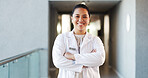 Doctor, healthcare and woman with arms crossed, portrait and cardiology specialist with career ambition. Female person, employee and caregiver in hospital for wellness, medical service and pride