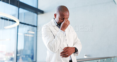 Buy stock photo Sad, doctor and man in hospital, thinking and emotional for patient loss, surgery mistake and regret. Unhappy, mature medical professional and black person with guilt for healthcare fail or stress