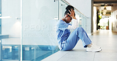 Buy stock photo Nurse, woman and stress in clinic hallway for patient loss, bad news and medical trauma on floor. Health professional, black person or anxiety in corridor for healthcare fail, hospital grief or space