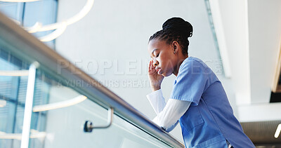 Buy stock photo Medical, upset or nurse in hospital with low angle, patient loss or stress in surgery result. Healthcare, anxiety or black woman in clinic with guilt, reflection and worry in emergency risk.