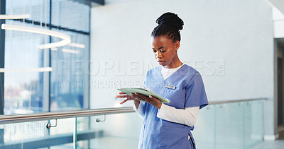 Buy stock photo Hospital, doctor and black woman on tablet in lobby for patient results, medical report and research. Healthcare, space and person on digital tech for planning, surgery schedule and typing in clinic