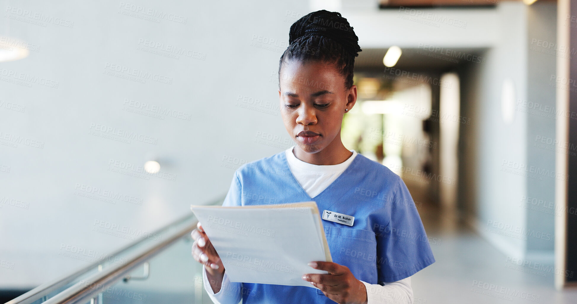Buy stock photo Nurse, reading and woman with documents, hospital and info for medical diagnosis, serious and report. Review, patient records and black person with paperwork for treatment plan, healthcare and file