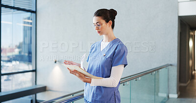 Buy stock photo Nurse, serious and woman with documents, hospital and info for medical diagnosis, reading and report. Check, patient history and person with paperwork for treatment plan, folder or healthcare records
