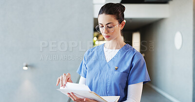 Buy stock photo Nurse, glasses and woman with documents, hospital and info for medical diagnosis, serious and report. Reading, patient history and person with paperwork for treatment plan, file or healthcare record
