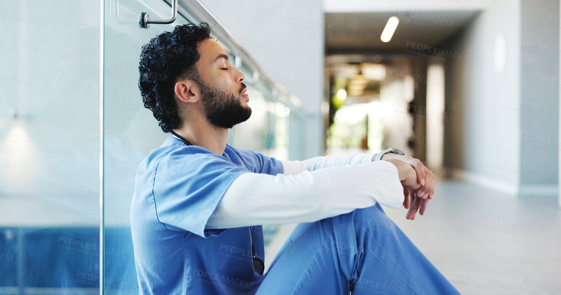 Buy stock photo Medical, sitting or nurse in hospital with disappointment, patient loss or stress in surgery result. Healthcare, bad news or man in clinic with guilt, reflection and worry in emergency risk.