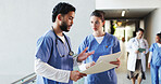 Doctors, discussion and people in workplace, documents and teamwork with feedback. Medical service, man and woman with healthcare, paperwork and support with hospital schedule, advice and cooperation