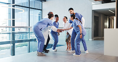 Buy stock photo Excited, people and nurses with handstack in hospital for celebration, surgery success and victory. Happy, healthcare workers and huddle for medical milestone, staff motivation and team achievement
