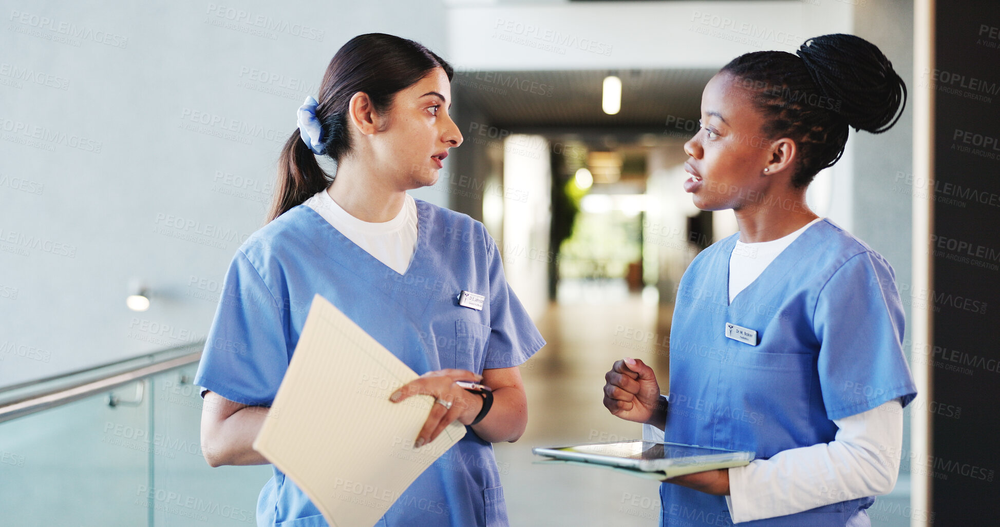 Buy stock photo Tablet, discussion and women nurses in hospital with collaboration for medical consultation. Digital technology, teamwork and female healthcare employees with nursing career with records in clinic.